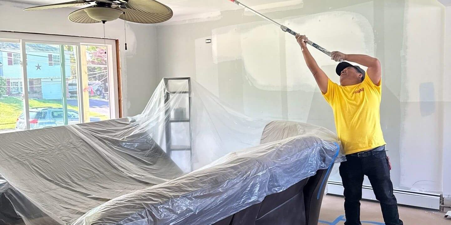 sunny day paint co painter painting ceiling in levittown home